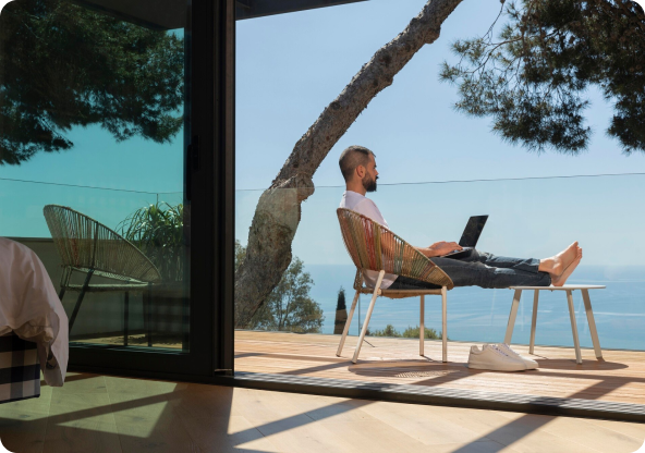 A person sitting on a balcony
