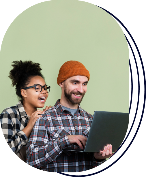 Two people looking at a notebook