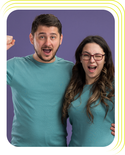 Two people hugging and celebrating
