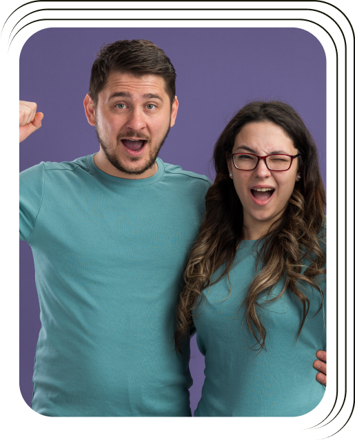 Two people hugging, celebrating
