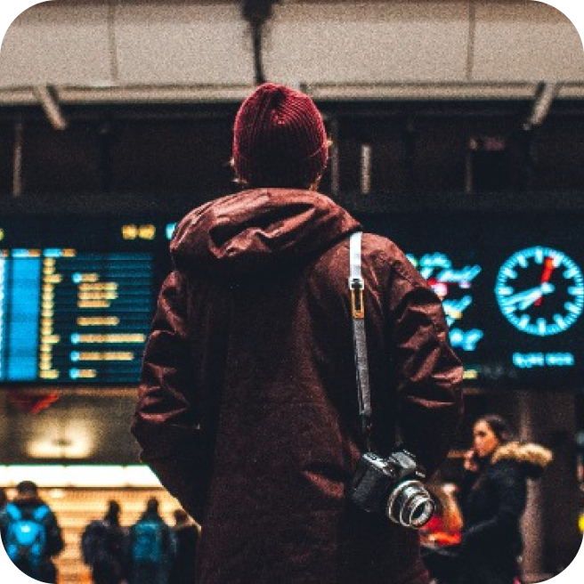 A person with their bag at the airport